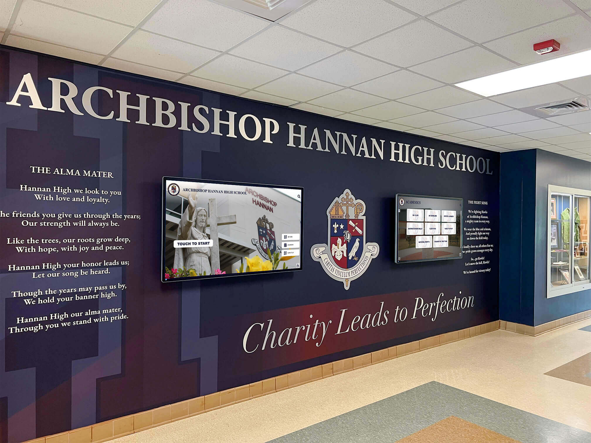 School entrance with digital displays and branded design